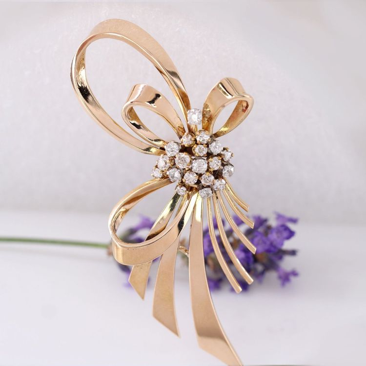 Spilla a fiocco vintage in oro rosa e diamanti