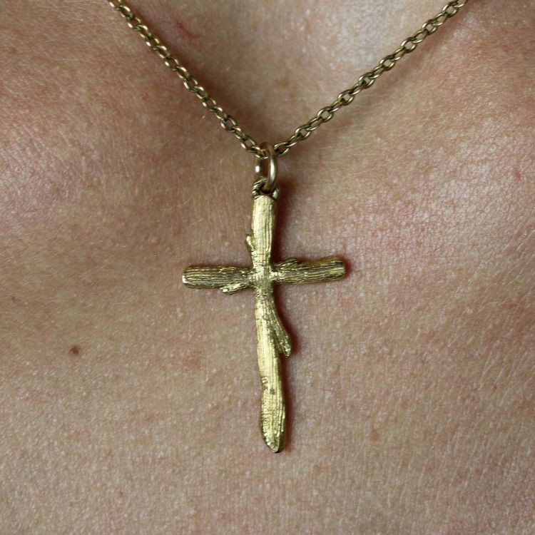 Croix or jaune texturé végétal