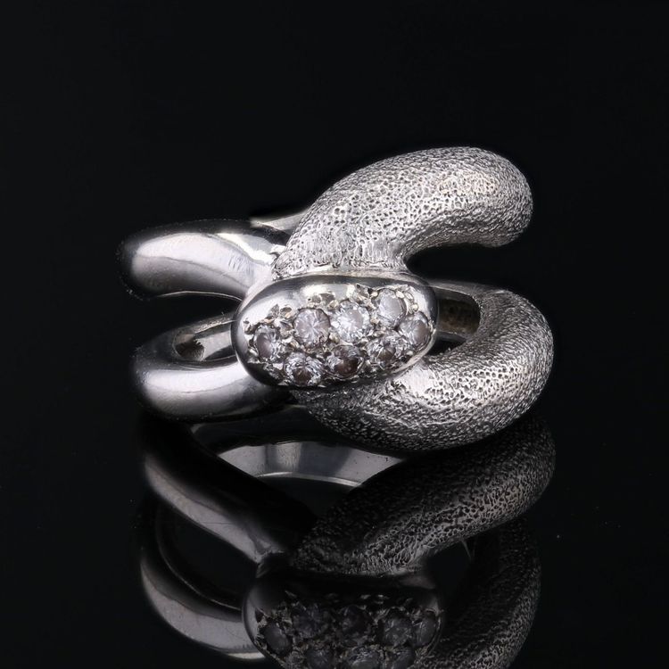 Bague or blanc diamants agrafe
