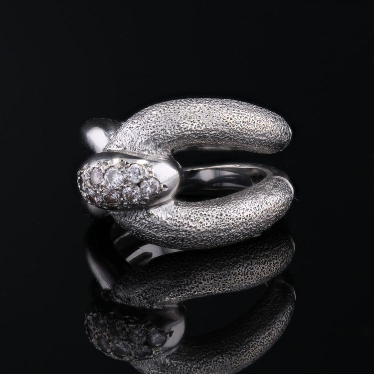 Bague or blanc diamants agrafe