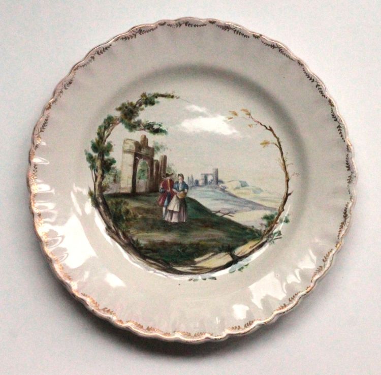 Assiette en faïence de Marseille à décor de paysage, 18e s.