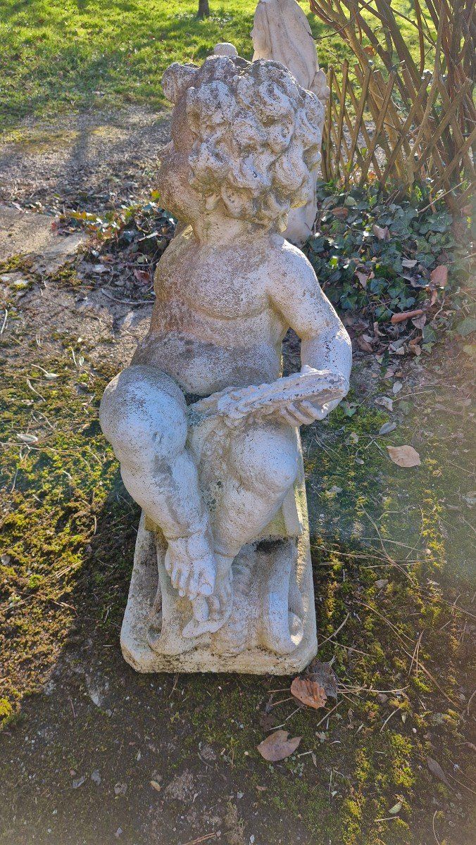 Engel aus Kunststein, Garten