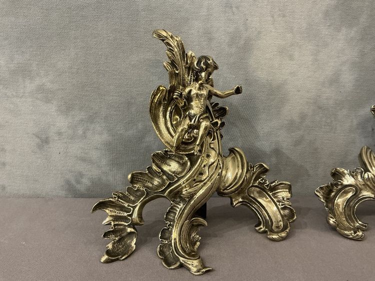 Paire de chenets en bronze d'époque 19 ème à décor de petits amours 