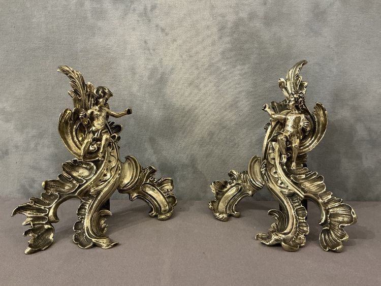 Paire de chenets en bronze d'époque 19 ème à décor de petits amours 