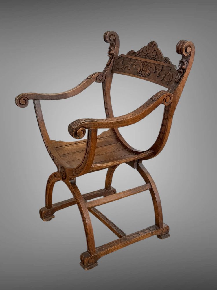 FAUTEUIL DIT " DAGOBERT " EN NOYER SCULPTÉ STYLE NEO- GOTHIQUE