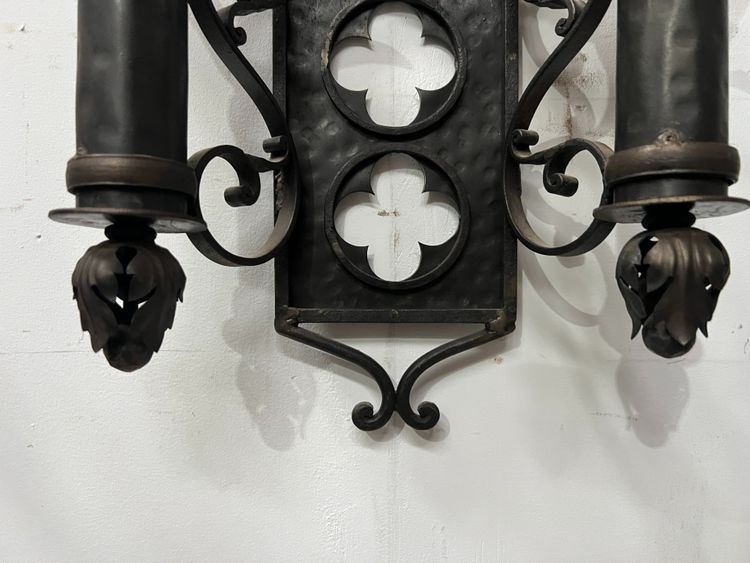 Set of three Renaissance-style wrought iron wall sconces, 20th century