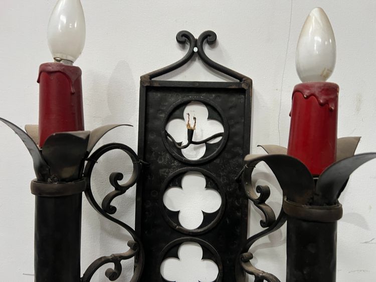 Set of three Renaissance-style wrought iron wall sconces, 20th century