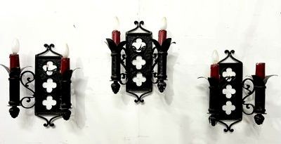 Set of three Renaissance-style wrought iron wall sconces, 20th century