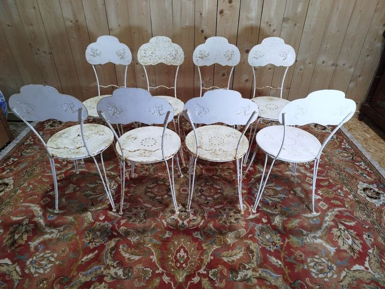 Suite mit 8 schmiedeeisernen Gartenstühlen