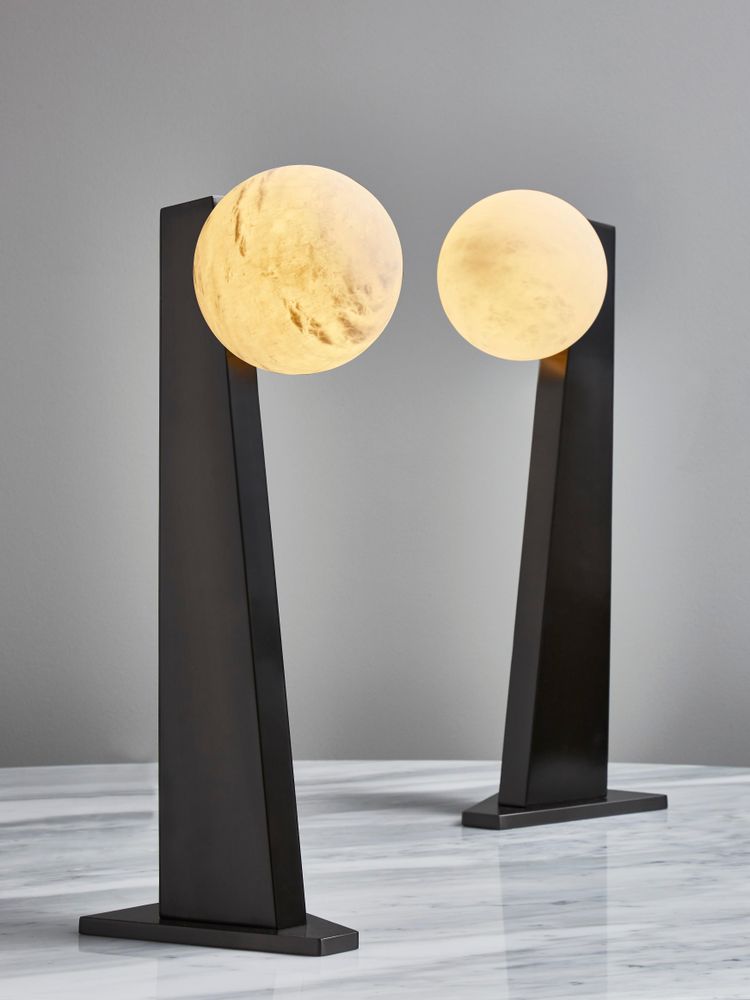 Glustin asymmetrical table lamps in brass with alabaster globe
