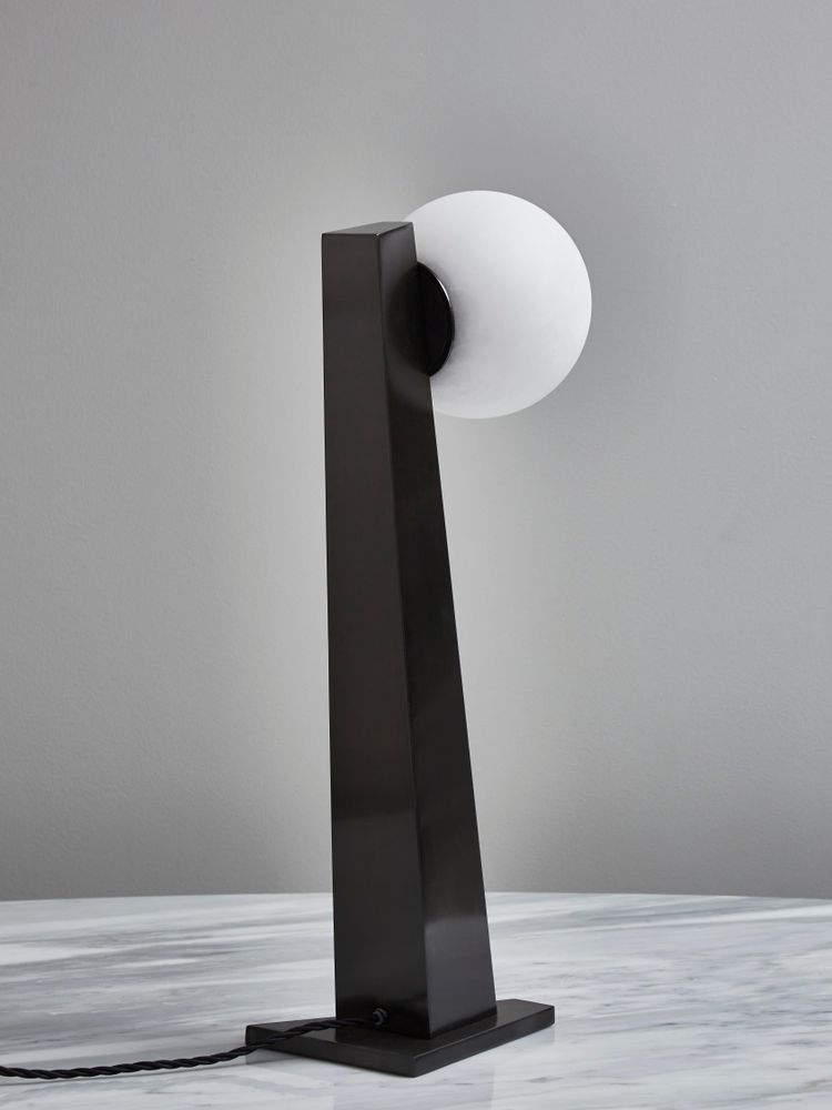 Glustin asymmetrical table lamps in brass with alabaster globe