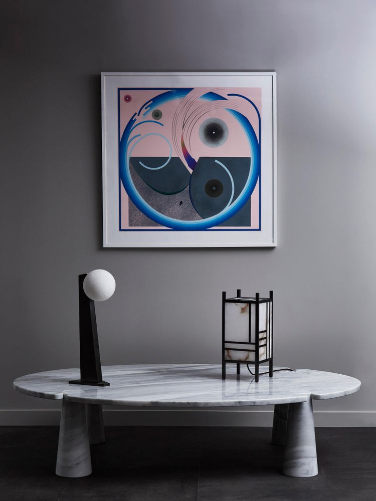 Glustin asymmetrical table lamps in brass with alabaster globe