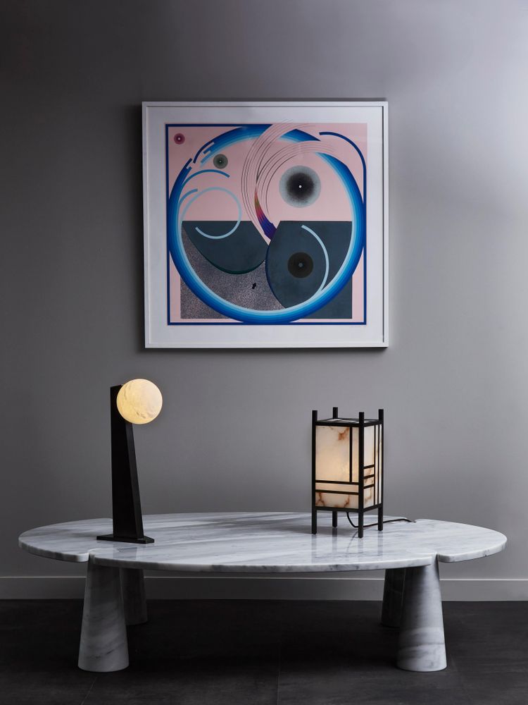 Glustin asymmetrical table lamps in brass with alabaster globe