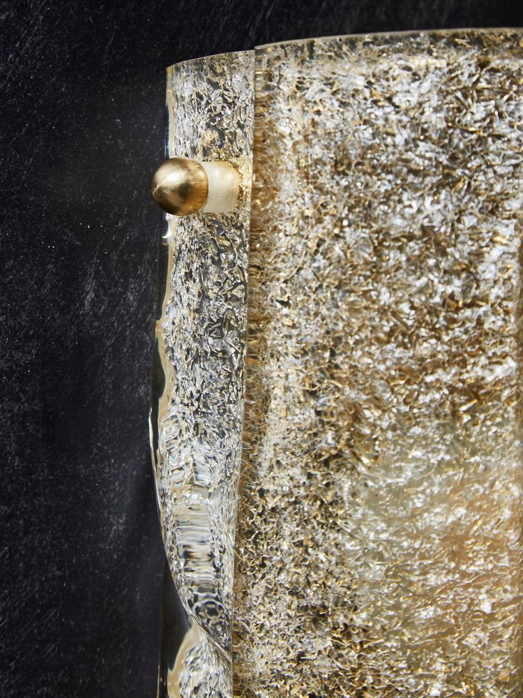 Small wall sconces in gold-speckled Murano glass