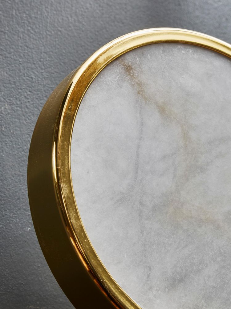 Alabaster bezels and brass flush mount from Glustin Luminaires