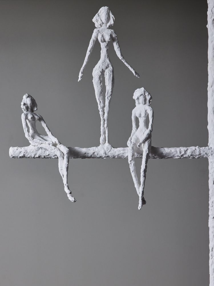 Linear chandelier with characters from Glustin Luminaires