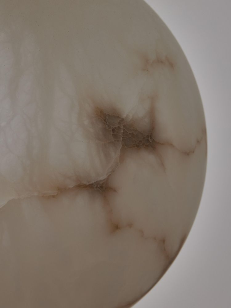 Vertical brass chandelier with alabaster globes