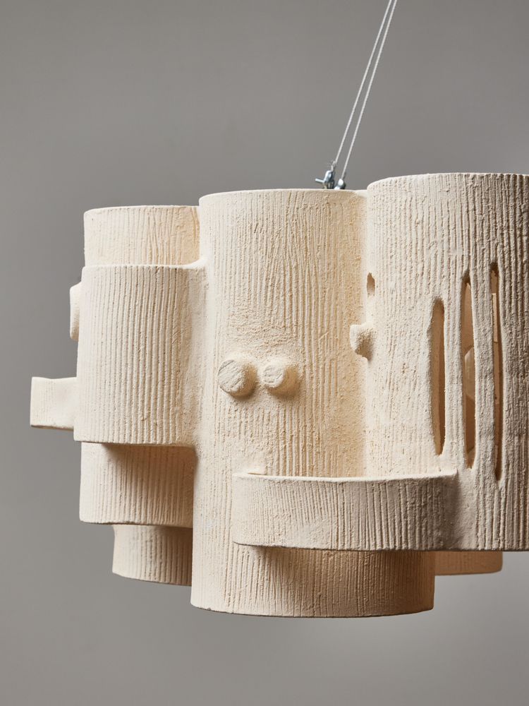 Circular chandelier by Olivia Cognet