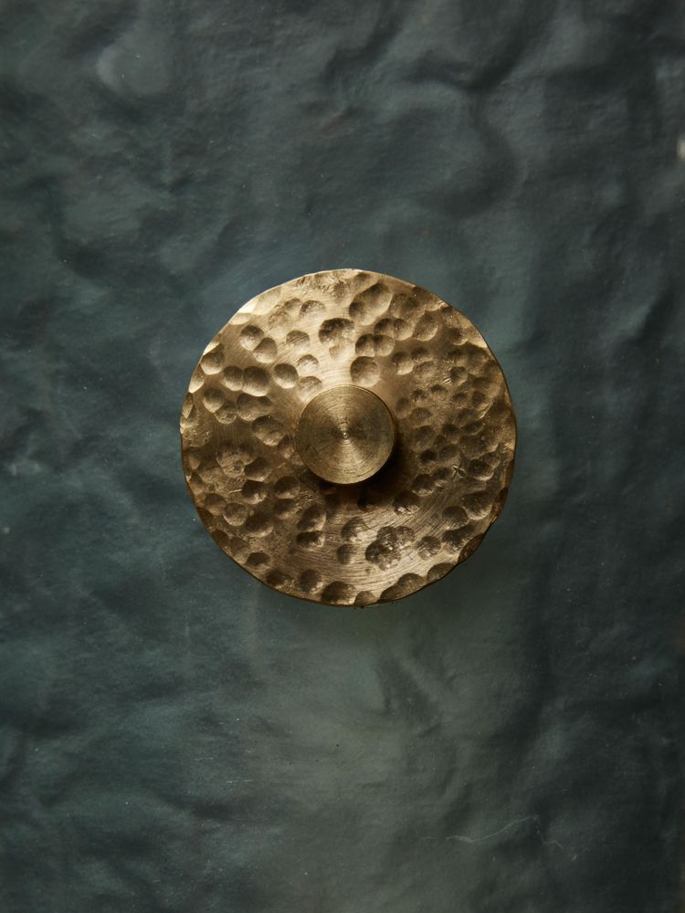 Teal Murano wall light with brass accents