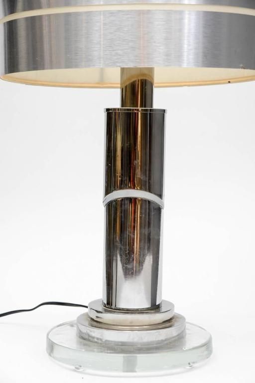 Eclectic set of five different stainless steel lamps with original shades