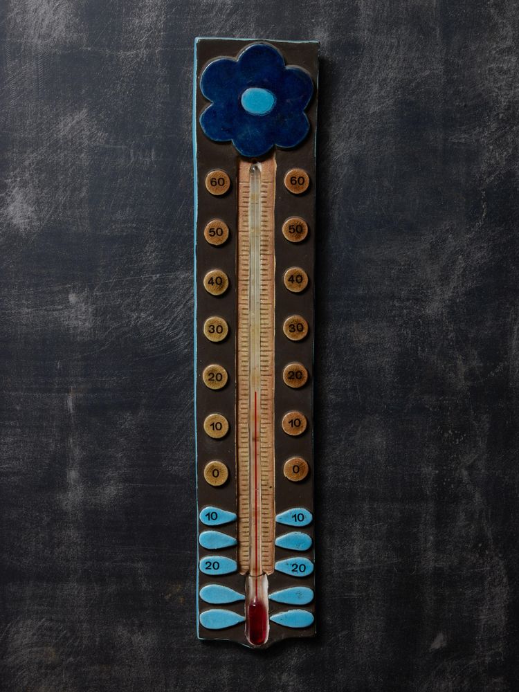 Thermomètre en céramique de Mithé Espelte avec motif de fleur