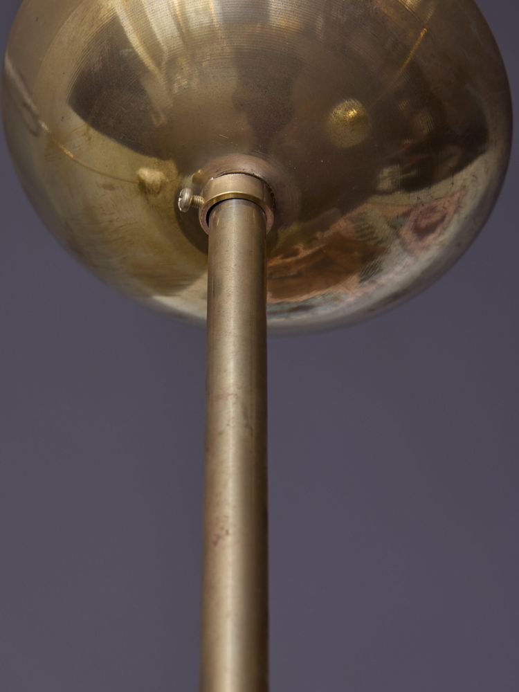 Brass pendant lights with painted glass globes