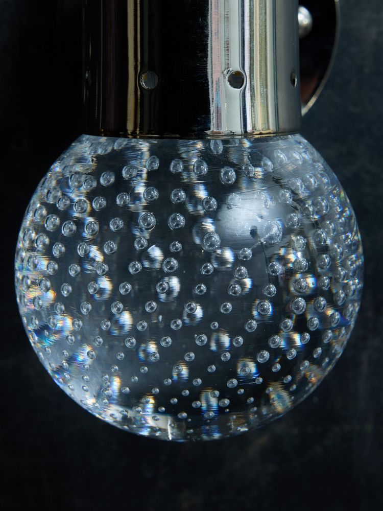 Nickel-plated brass wall sconces with bubbled Murano glass globe