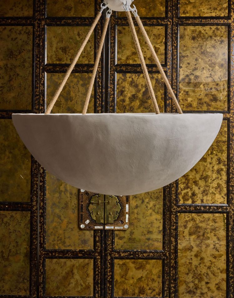 Plaster chandelier with interior lighting