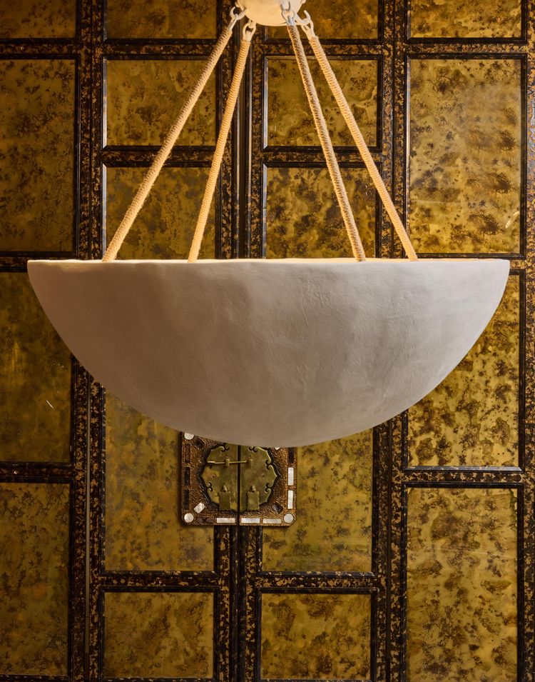 Plaster chandelier with interior lighting