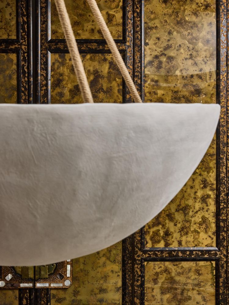 Plaster chandelier with interior lighting