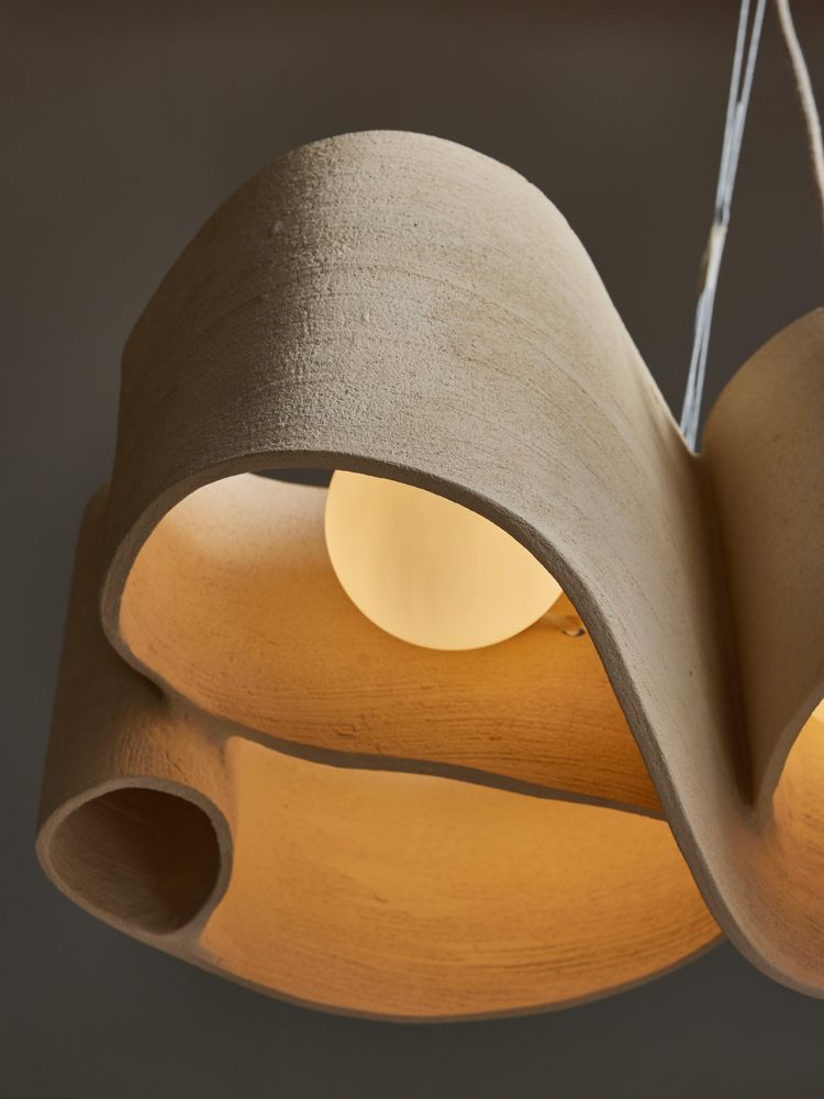 Long ceramic chandelier by Olivia Cognet