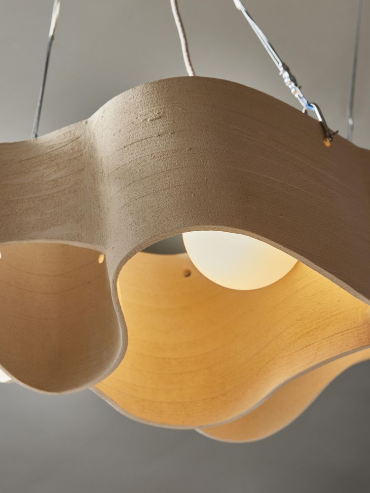 Long ceramic chandelier by Olivia Cognet