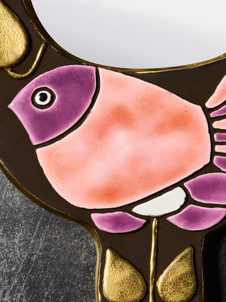 Sparrow mirror held in the hand by Mithé Espelt