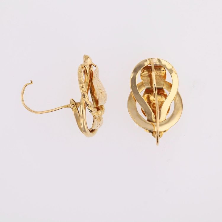 Boucles d’oreilles anciennes dormeuses en jaune ciselé