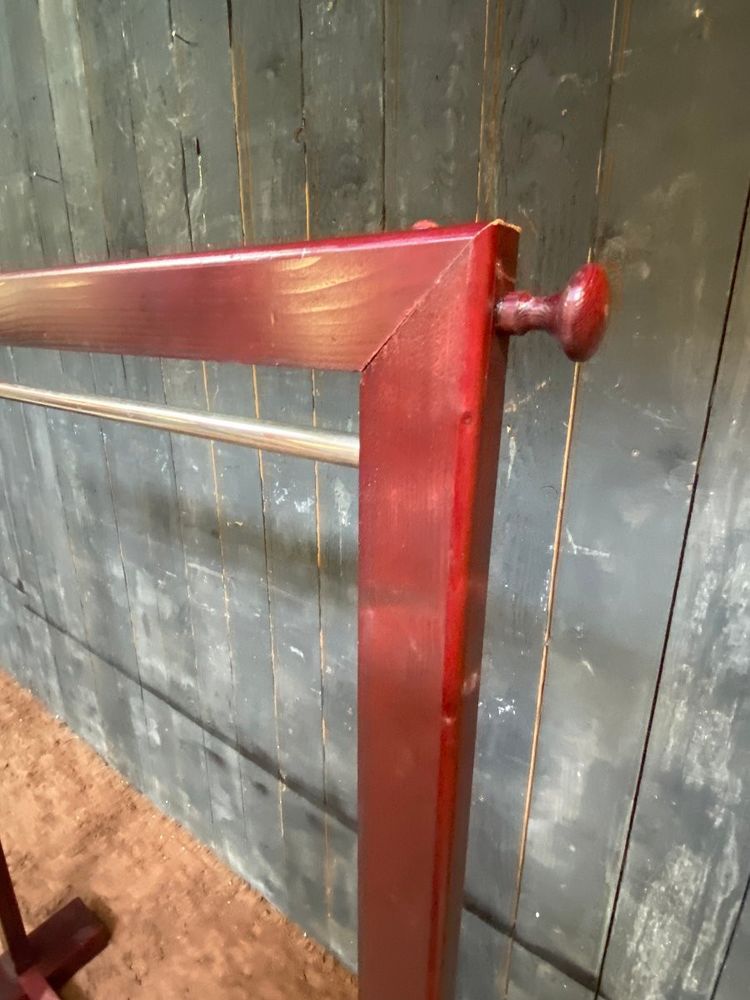 Due appendiabiti in legno tinto e ottone 1970/1980 ca.