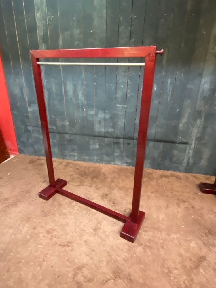 Due appendiabiti in legno tinto e ottone 1970/1980 ca.