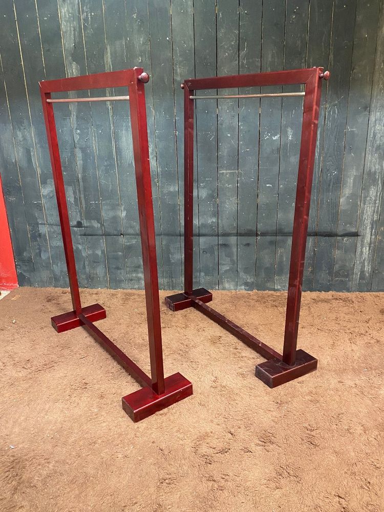 Due appendiabiti in legno tinto e ottone 1970/1980 ca.