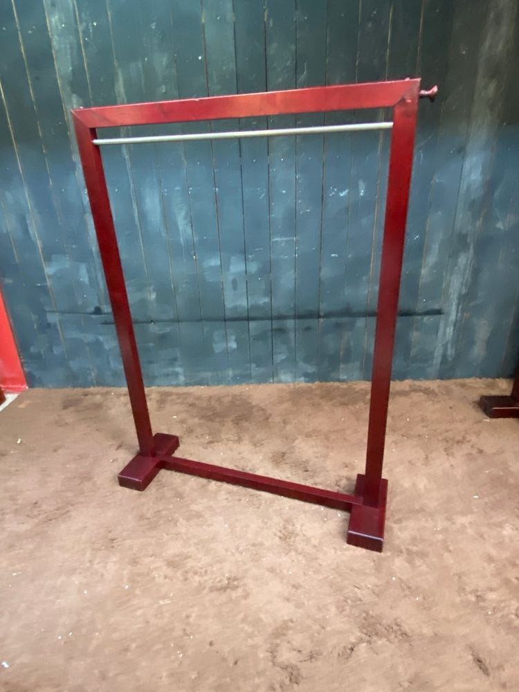 Due appendiabiti in legno tinto e ottone 1970/1980 ca.