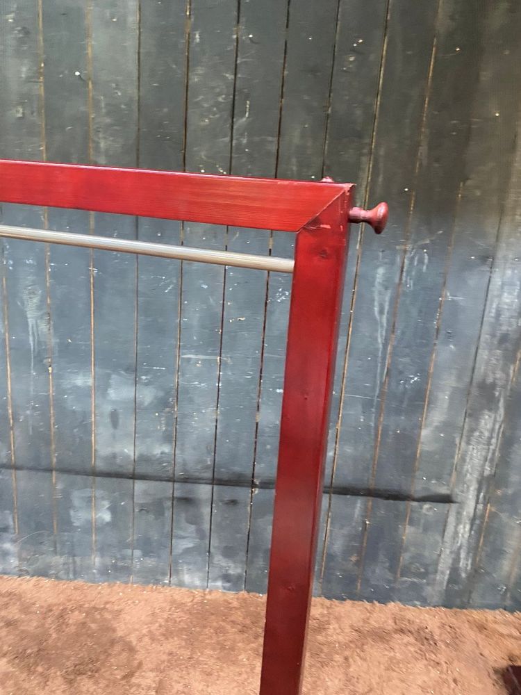 Due appendiabiti in legno tinto e ottone 1970/1980 ca.