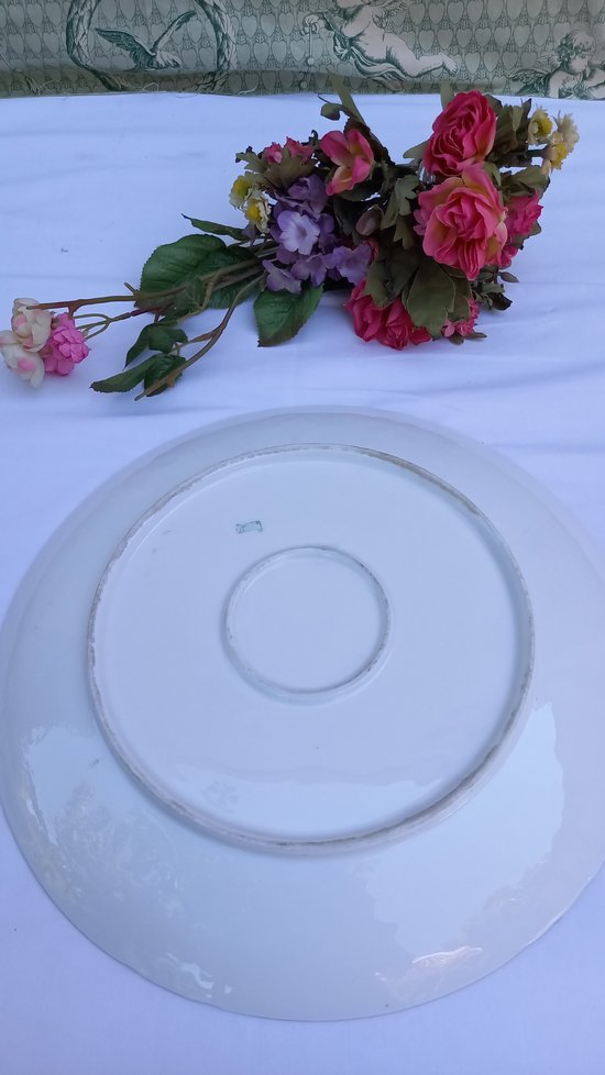 Decorative plates in Limoges porcelain from the 20th century