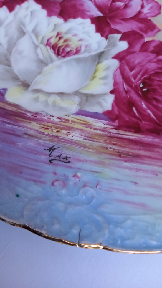 Decorative plates in Limoges porcelain from the 20th century