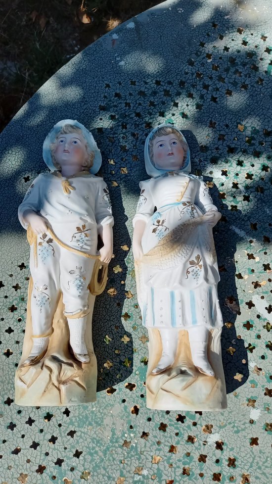 19th century porcelain biscuit statuettes