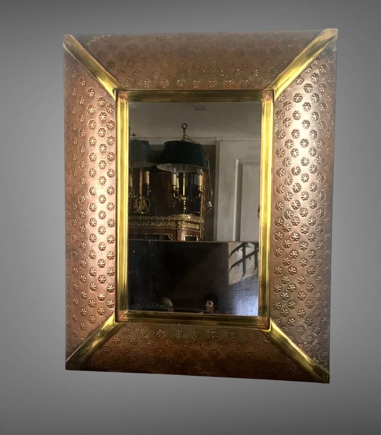 EMBOSSED COPPER AND BRASS MIRROR DECORATED WITH FLOWERS FROM THE 70S