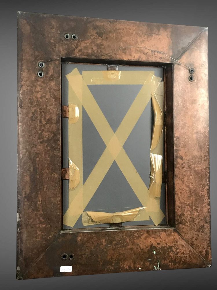 EMBOSSED COPPER AND BRASS MIRROR DECORATED WITH FLOWERS FROM THE 70S