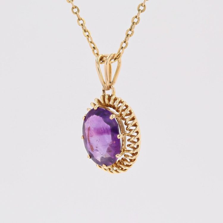 Pendentif améthyste spirale d'or