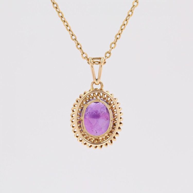 Pendentif améthyste spirale d'or