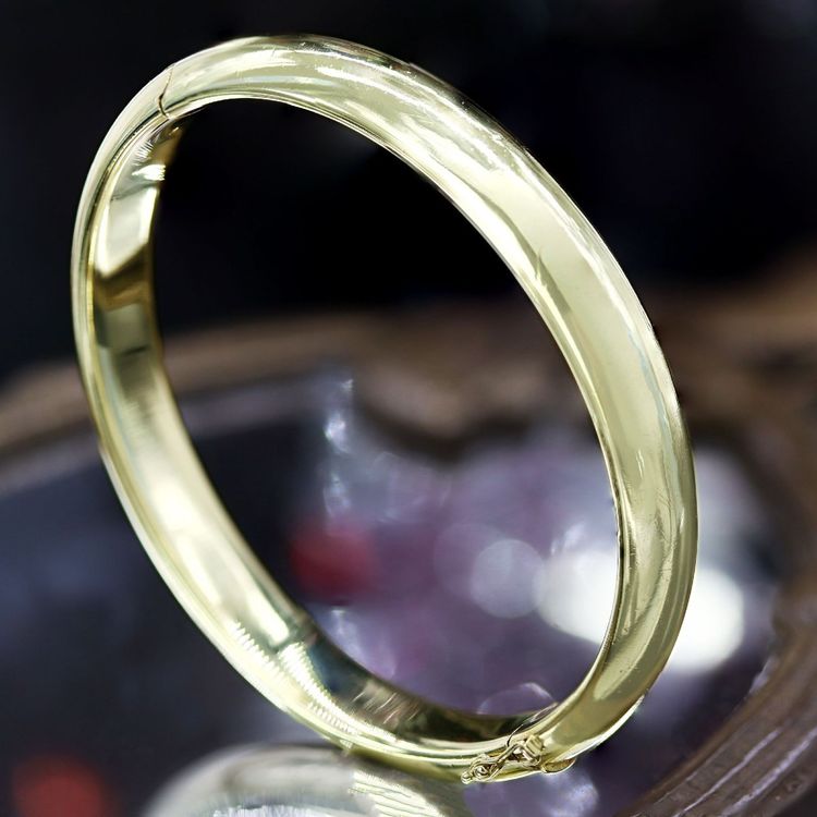 Halbarmreif aus Gelbgold