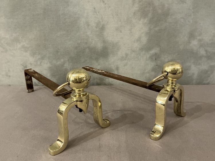 Pair of polished brass andirons circa 1970