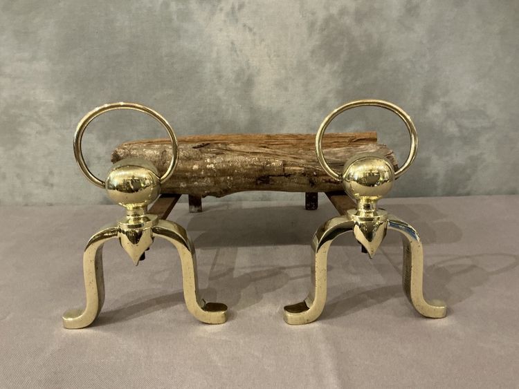 Pair of polished brass andirons circa 1970