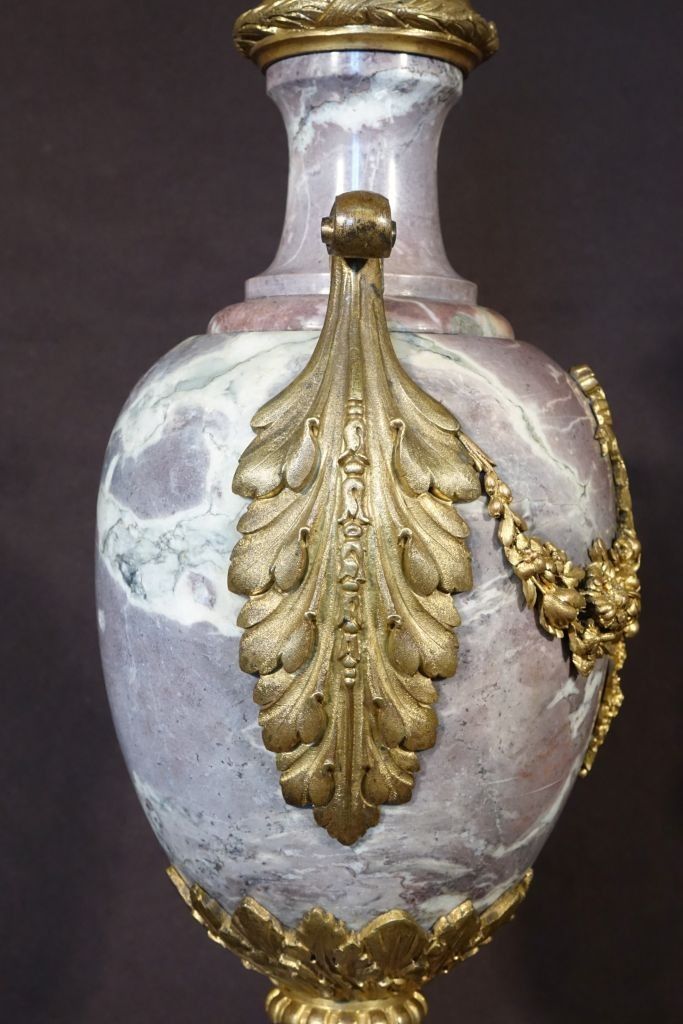 Pair Of Marble Covered Vases